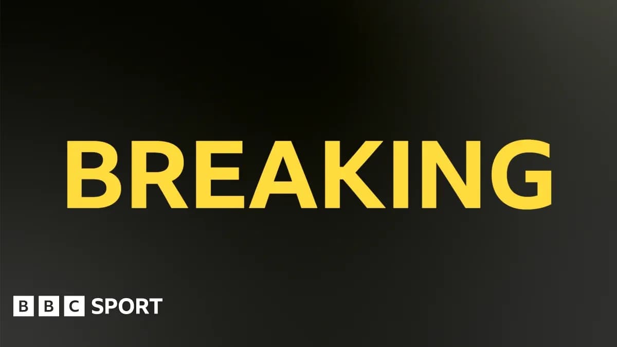 Слово 'BREAKING' на черном фоне