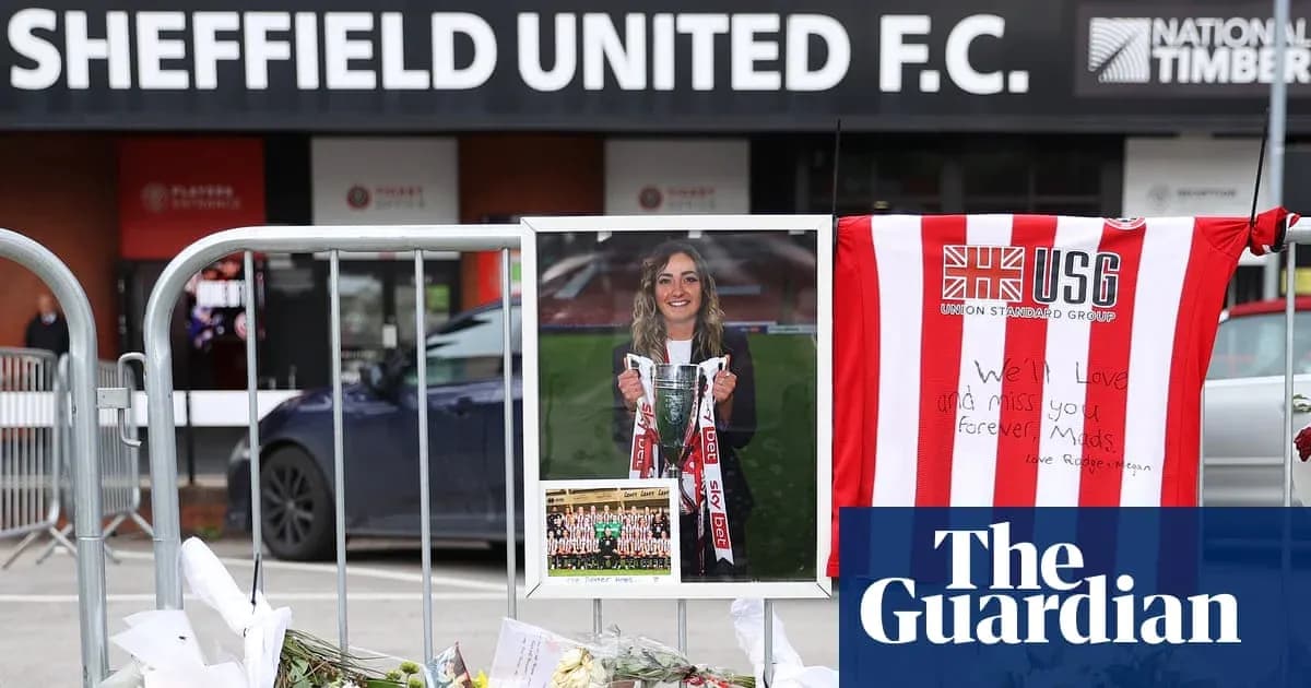 Memorial outside Sheffield United F.C. with flowers and photo