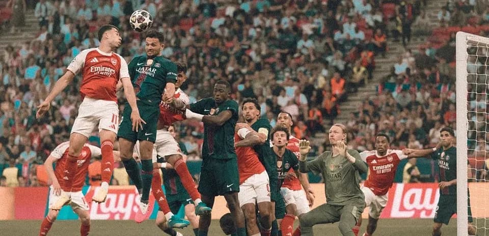 Players contesting a high ball during a match