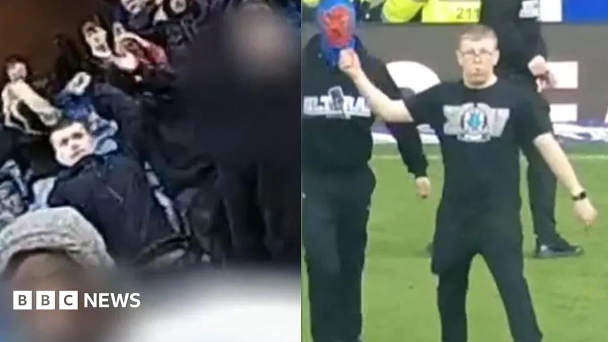 Fans celebrating in the stands during match Fans celebrating in the stands during match