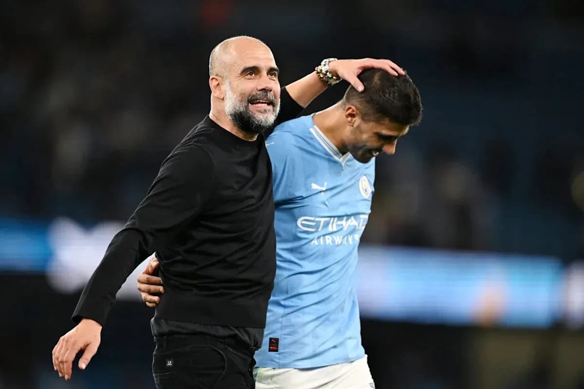 Тренер и игрок Manchester City после матча Тренер и игрок Manchester City после матча